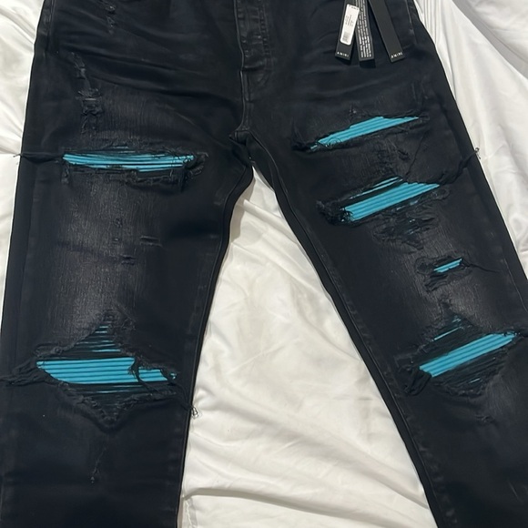 AMIRI Black Skinny Jeans with Distressed Blue Accents - Picture 1 of 2